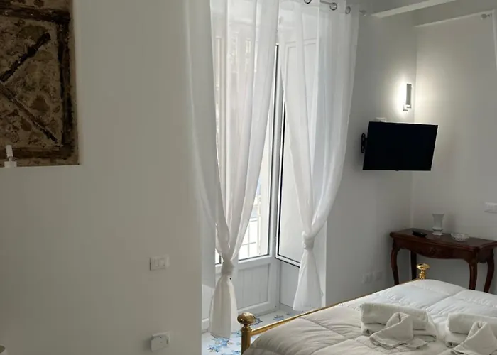 Casa Angelieri Apartments & Rooms